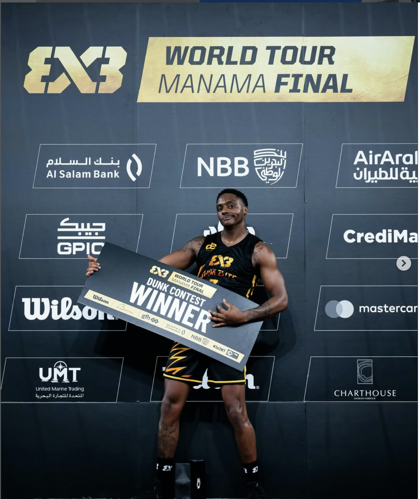 The Royal Guard holding the FIBA 3x3 World Tour Manama Final dunk contest winner board