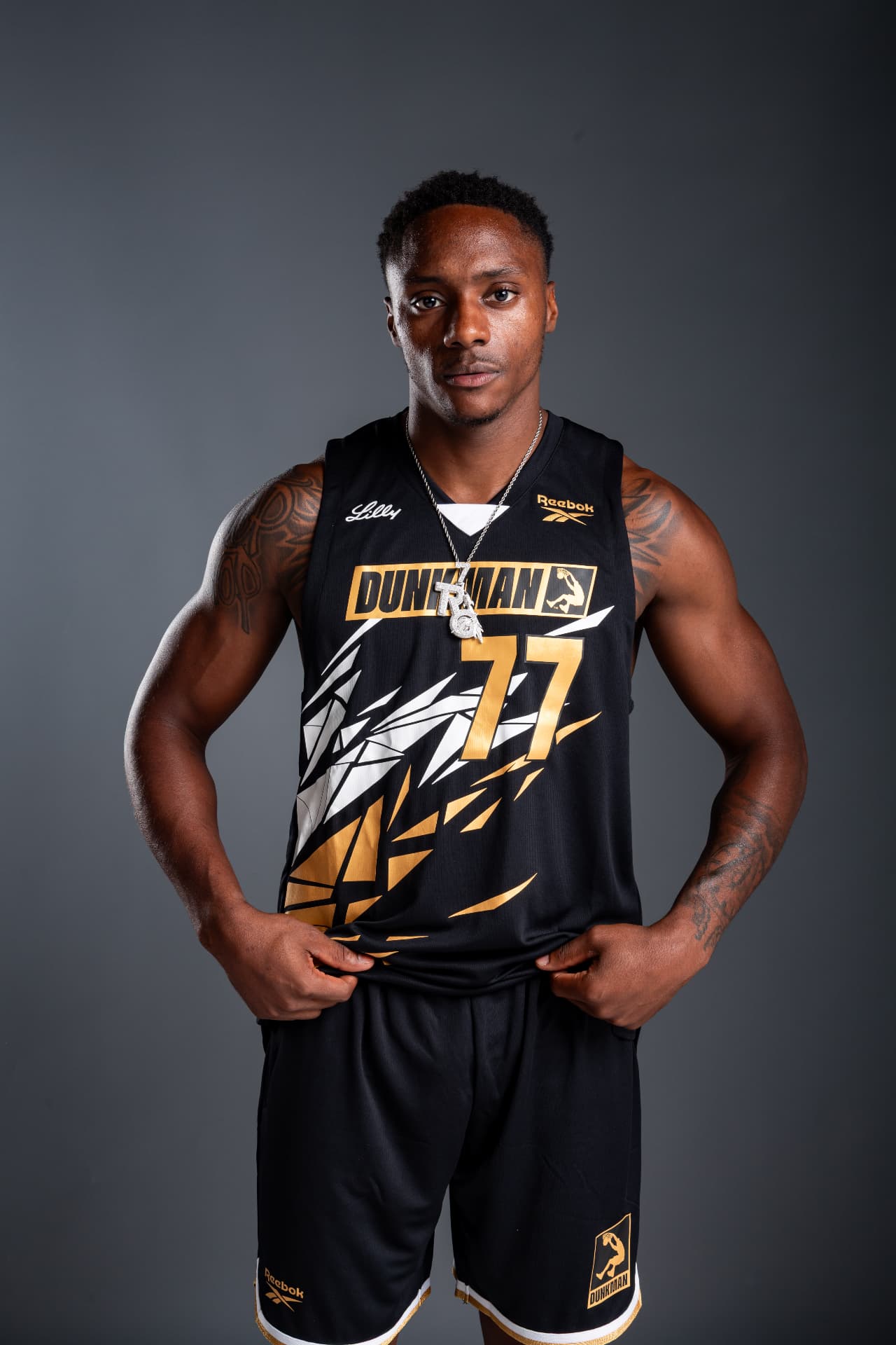 The Royal Guard in his black and gold Dunkman League number 77 jersey